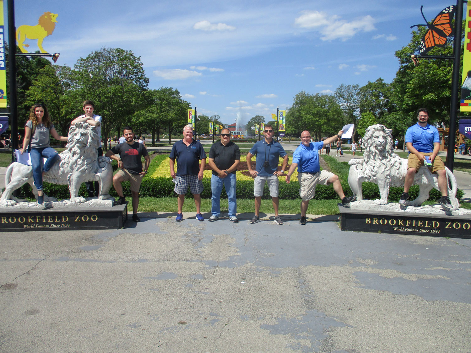 Team GorillaZ taking a mandatory group photo with the lions.